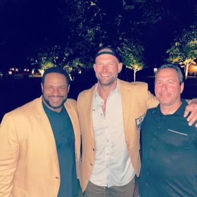 Peter Schaffer with two Hall of Fame clients in gold jackets